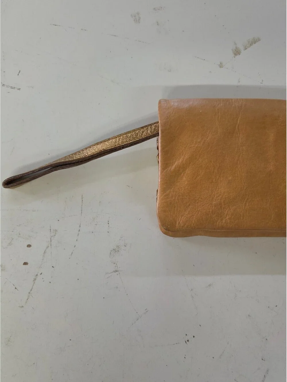 Samvara Leather Wristlet Clutch with Gold Embroidered Detail